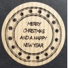 Kerst 03 rol @ 500 perm. rond 35 kraft zwart bedrukt merry christmas happy newyear Kerst 03 rol @ 500 perm. rond 35 kraft zwart bedrukt merry christmas happy newyear